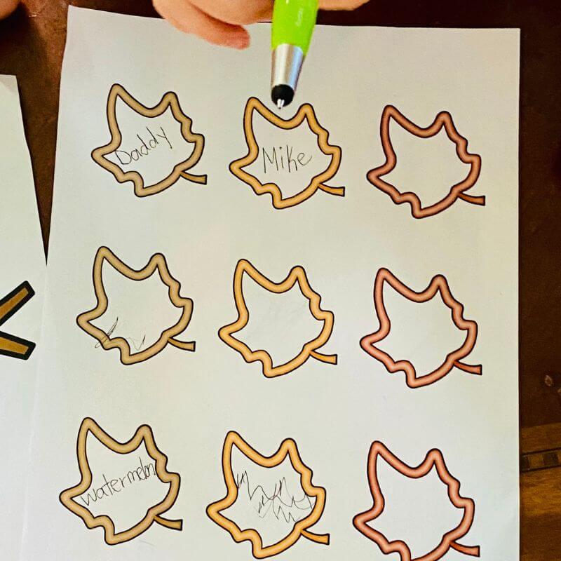 paper leaves with writing on them